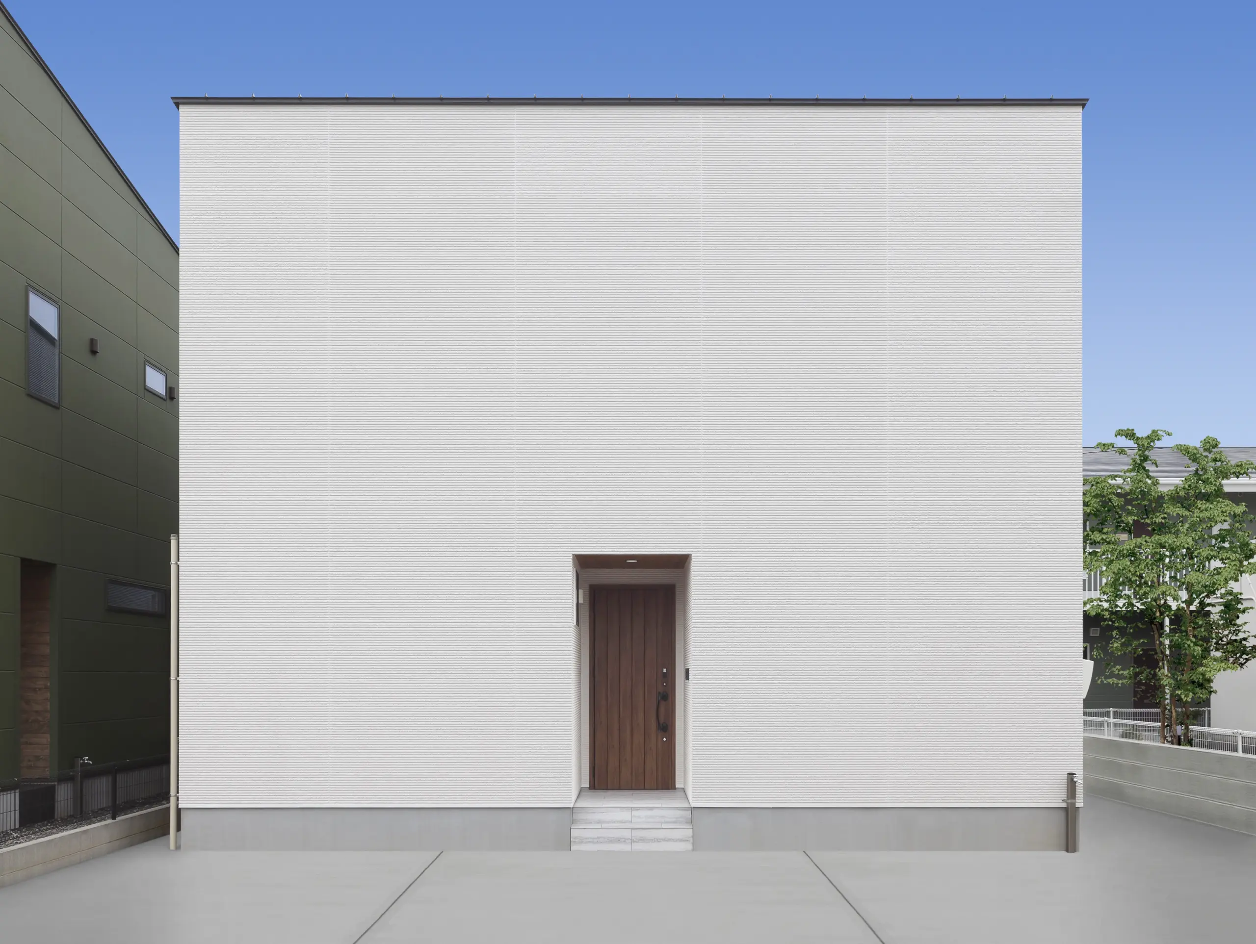 光と空を楽しむ、白いキューブの家